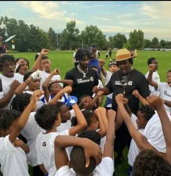Florida Elite athletes in a team huddle